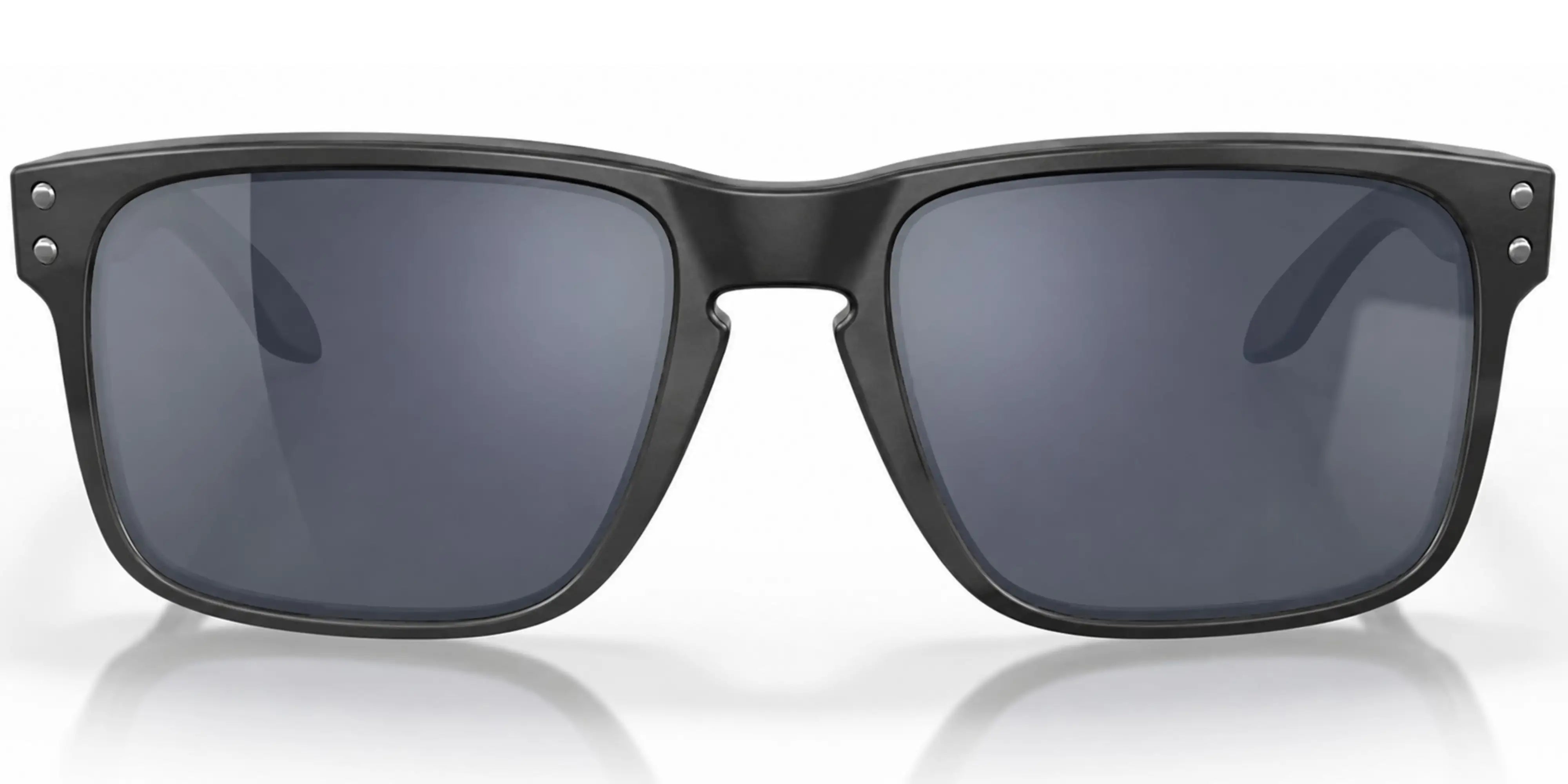 Black oakley sunglasses with dark lenses on a white background