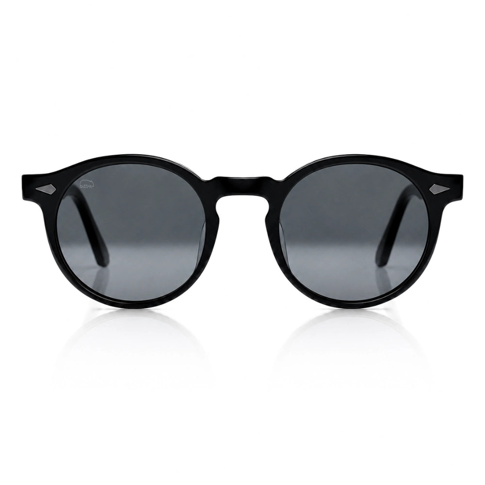 Round black sunglasses with dark gray lenses, shown from the front on a clean white background with a subtle reflection below.