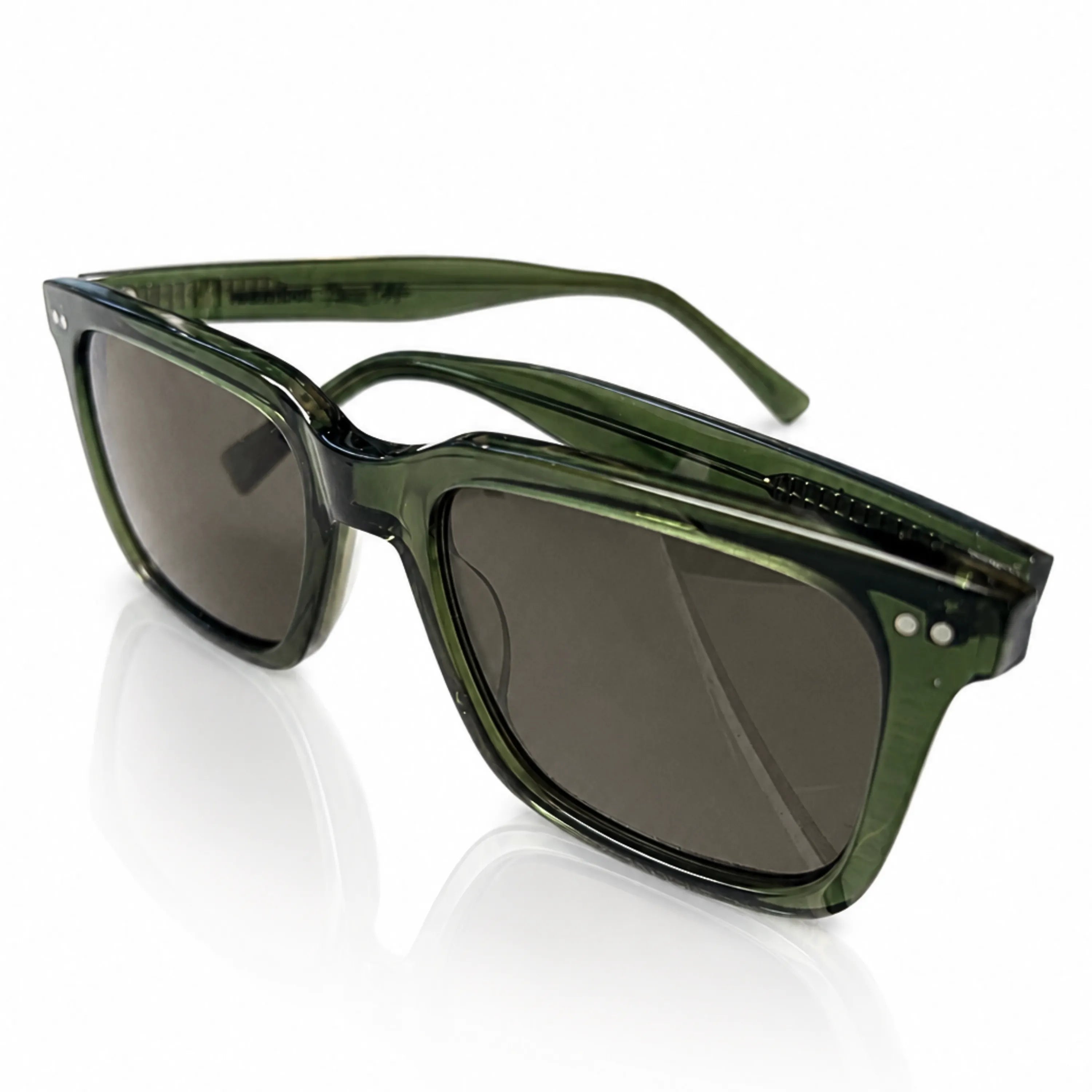 Wombat Oslo premium sunglasses three-quarter angle — bottle green bio-acetate and grey CR39 polarised lenses