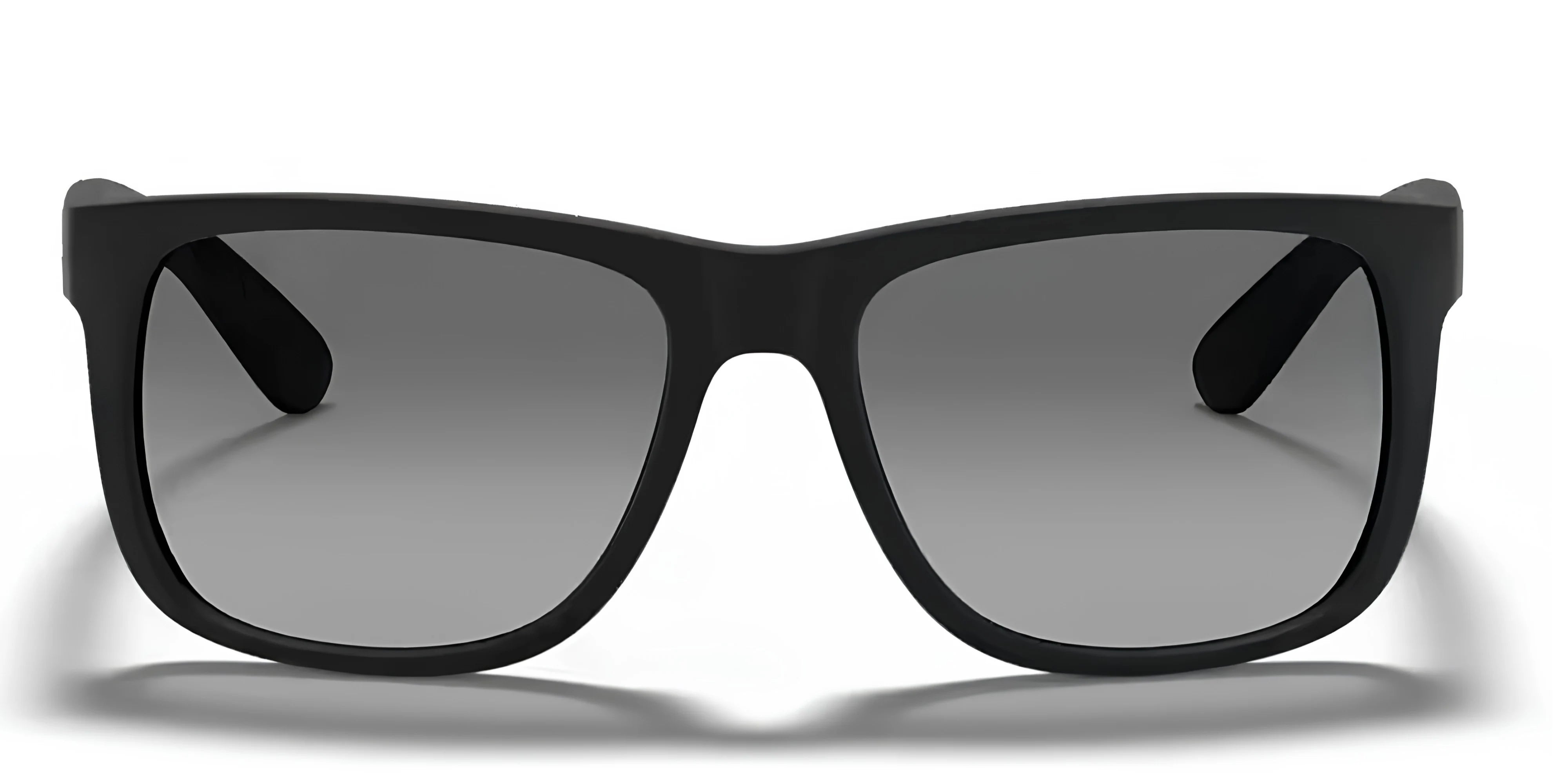 Black sunglasses with dark lenses on a white background