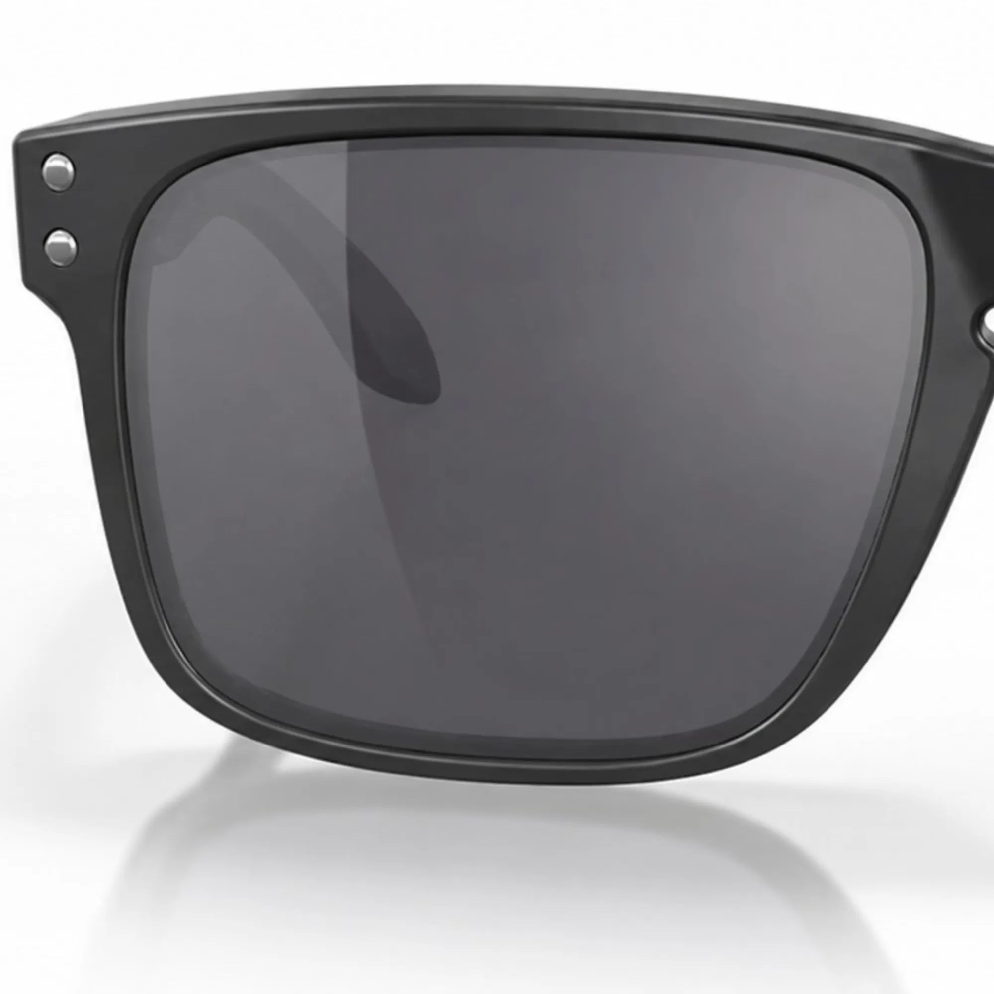 Black oakley sunglasses with dark lenses on a white background