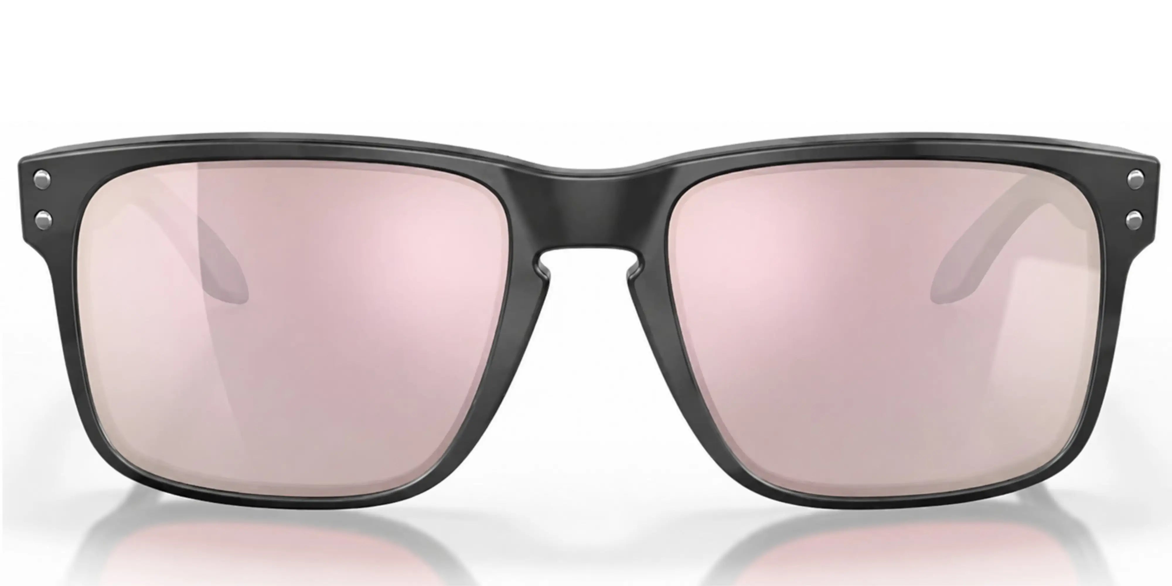 Sunglasses with black frame and pink lenses on a white background