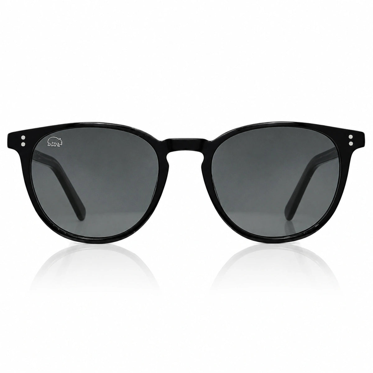 Black round-frame sunglasses with dark gray lenses, shown from the front on a white background with a soft reflection below.